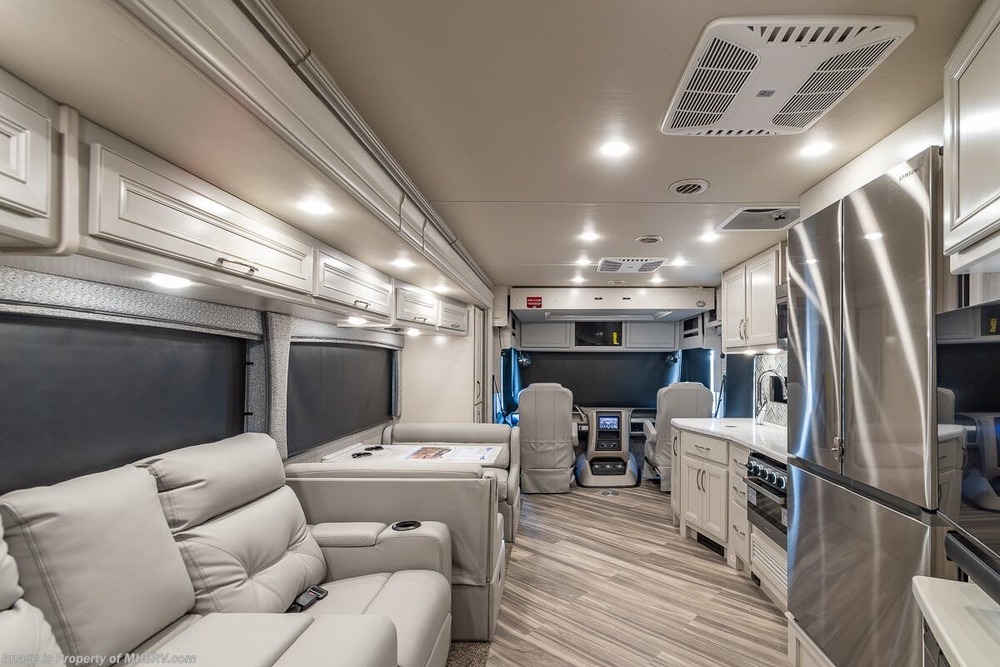 interior rv picture of a luxury motorhome with good lighting